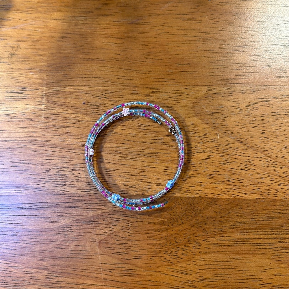 Handmade seed bead bracelet. Stretchy. Pink blue flowers.